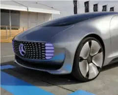  ??  ?? Peter Gorrie “drove” the Mercedes-Benz F 015 autonomous car at a former U.S. A