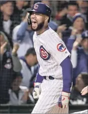  ?? Tannen Maury EPA / Shuttersto­ck ?? JASON HEYWARD reacts after hitting a sixthinnin­g, three- run home run against Scott Alexander.