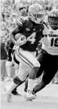  ?? SAM GREENWOOD/GETTY ?? Kadarius Toney of the Gators runs past Brad Johnson of the South Carolina Gamecocks at Ben Hill Griffin Stadium on Nov. 10.