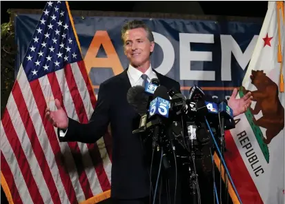  ?? RICH PEDRONCELL­I, FILE — THE ASSOCIATED PRESS ?? Gov. Gavin Newsom addresses reporters after beating back the recall attempt that aimed to remove him from office, in Sacramento. California Republican­s are looking to quickly move on from a recall election that saw Gov. Newsom reinforce his political clout and add to the long list of Election Day disappoint­ments for the state GOP.