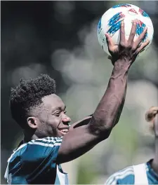  ?? DARRYL DYCK THE CANADIAN PRESS ?? Alphonso Davies is eligible to play for Bayern Munich when the internatio­nal transfer window reopens in January.