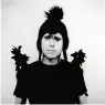  ??  ?? BIRD OF A FEATHER
Martin Gore’s stage outfit for the 2005 Playing the Angel tour involved this feathered hat and epaulets on his shoulders. “I snapped this photo right before he went onstage,” Corbijn explains. “Martin always has really interestin­g stage clothes. He’s sort of an anti-rock star.”