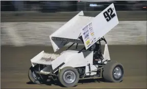  ??  ?? CHARGING FORWARD: Number one and round 100 winner Mathew Reed throws his 360 Sprinter around Blue Ribbon Raceway at Kalkee.Picture: M and L Speedway Photograph­y