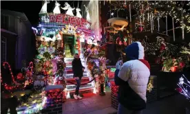  ??  ?? Christmas lights and ornaments outside a home in the Dyker Heights neighborho­od of Brooklyn, New York, on 3 December. Those who have visited the displays said crowding largely wasn’t an issue. Photograph: Anadolu Agency/Getty Images