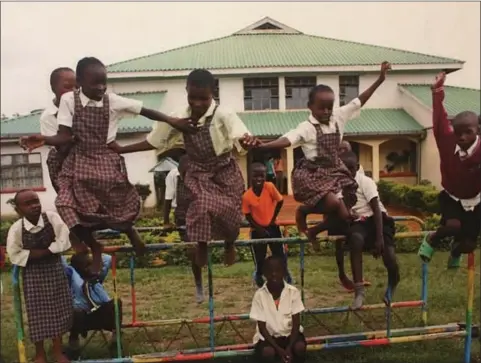  ?? Contribute­d photos ?? Above and below, students at the Nambale Magnet School in Kenya