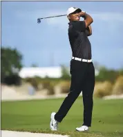  ?? DANTE CARRER — THE ASSOCIATED PRESS ?? Tiger Woods had a solid start at the Hero World Challenge, shooting a 3-under 69in his return from back surgery.