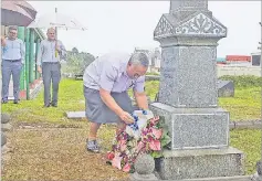  ?? Picture: ANISH CHAND ?? Motibhai Group of Companies executive directors Rajesh Patel and Jinesh Patel look on as The Fiji Times editor Fred Wesley places a wreath on the grave of the late George Littleton Griffiths at the Suva Cemetery last month.