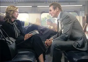  ?? Jay Maidment ?? VERA FARMIGA as Joanna and Liam Neeson as Michael star in Jaume Collet-Serra’s “The Commuter.”