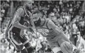  ?? Michael Wyke / Associated Press ?? James Harden (13) elude a JaMychal Green.