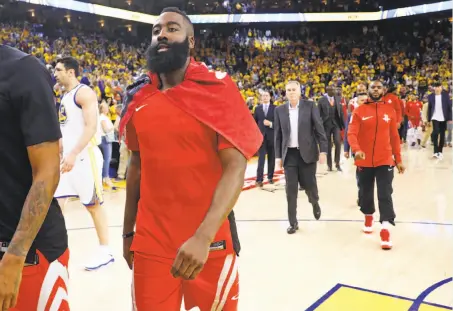  ?? Scott Strazzante / The Chronicle ?? LeBron James could bring a title to Houston alongside James Harden (left) and Chris Paul if the Rockets dump other salaries.