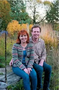  ??  ?? Will and Sarah Murch surrounded by soft autumn colour at Ellicar Gardens.