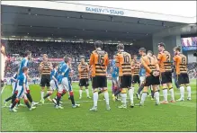  ??  ?? ODD MAN OUT: Alloa’s Michael Duffy (No.7), on loan at the club from Celtic, didn’t join with his team-mates in paying tribute to champions