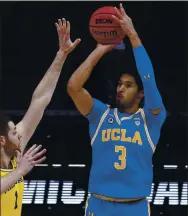  ?? MICHAEL CONROY — THE ASSOCIATED PRESS ?? UCLA guard Johnny Juzang could be the key to leading the Bruins past Gonzaga in the Final Four today.