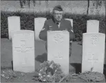  ?? SUBMITTED ?? Cpl. John Joseph Higgins visits the gravesite of his great, great uncle Sgt. Edmund James Higgins during a trip to France in July 2016.