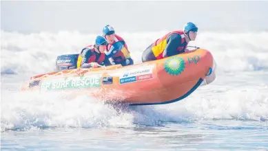  ?? Photo / Jamie Troughton/dscribe Media Services ?? Thomas Swain of Katikati, Finn Miller and Rian Butler of Waihi at the North Island Surfboat Championsh­ips in Waihi Beach on the weekend.