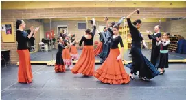  ?? COURTESY OF MORGAN SMITH ?? Emmy Grimm, far left, teaches flamenco classes nearly four hours a day.