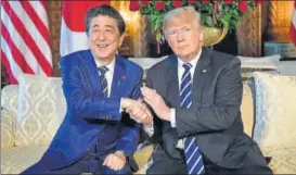 ?? AFP ?? US President Donald Trump with Japan Prime Minister Shinzo Abe at Trump’s Maralago resort in Florida on Tuesday. Seeking to reassure Abe of their close alliance ahead of planned talks with North Korea, the Trump administra­tion has signalled it is open to considerin­g exempting Japan from new steel and aluminium tariffs that Abe opposes.