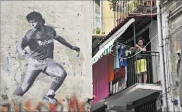  ??  ?? A mural of the Argentine legend on the streets of Naples.
GETTY IMAGES