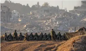  ?? Photograph: Ohad Zwigenberg/AP ?? Israeli soldiers take positions near the Gaza border. Hamas has told the Iranian foreign minister that it has the means to resist Israel for several years