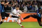  ?? PIC: DAVE WINTER/ SHUTTERSTO­CK ?? PSG’s Lionel Messi bends a typically fearsome effort against the crossbar but his combinatio­ns with Neymar and Kylian Mbappé failed to overly trouble Club Brugge