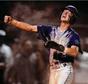  ?? Eric Christian Smith/Contributo­r ?? Ridge Point’s Owen Farris celebrates after scoring a run during the sixth inning of Game 2 of the Region III-6A quarterfin­al against Tompkins on Friday.