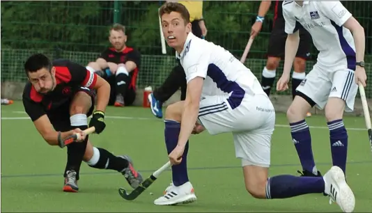  ?? ?? Dunfermlin­e Carnegie Hockey Club’s men’s first XI captain Michael Ross in action. Photos: Ted Milton