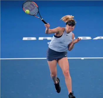  ?? AFP ?? Ukraine’s Elina Svitolina returns to Ana Konjuh of Croatia in their Brisbane Internatio­nal Round of 16 match at the Pat Rafter Arena on Wednesday. Svitolina won 6- 3, 6- 1. —