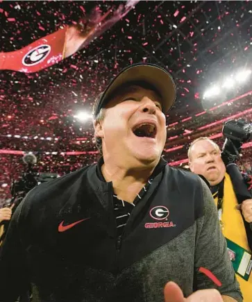  ?? ASHLEY LANDIS/AP ?? Coach Kirby Smart celebrates after Georgia’s win in the College Football Playoff championsh­ip game Monday.