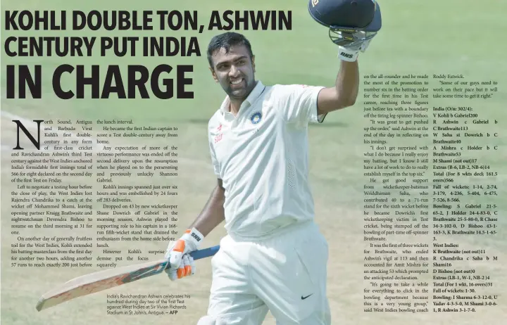  ?? — AFP ?? India’s Ravichandr­an Ashwin celebrates his hundred during day two of the first Test against West Indies at Sir Vivian Richards Stadium in St John’s, Antigua.