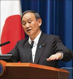  ?? HIRO KOMAE/ASSOCIATED PRESS ?? Japanese Prime Minister Yoshihide Suga has repeatedly vowed to skeptical lawmakers that the Tokyo Olympics will be safe, though only 1% of the public has been fully vaccinated.