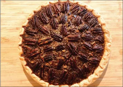  ?? (Arkansas Democrat-Gazette/Sean Clancy) ?? Sorghum Pecan Pie