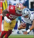  ?? JOSE CARLOS FAJARDO/TRIBUNE NEWS SERVICE ?? The San Francsico 49ers' Reuben Foster (56) tackles Dallas Cowboys quarterbac­k Dak Prescott (4) in the first quarter during a preseason game in Santa Clara on Aug. 9.