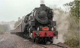  ??  ?? S160 2-8-0 No. 5197 is seen heading the phase 1 reopening special on the then freshly completed section of track on October 11, 2019. DAVE GIBSON / NSRC ARCHIVE