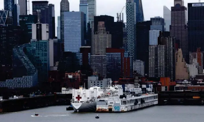  ?? Photograph: Mike Segar/Reuters ?? The USNS Comfort is seen docked at Pier 90 in Manhattan.