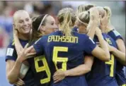  ?? DAVID VINCENT — THE ASSOCIATED PRESS ?? Sweden’s Stina Blacksteni­us, left, with teammates celebrates after scoring her side’s second goal during the of the Women’s World Cup quarterfin­al soccer match between Germany and Sweden at Roazhon Park in Rennes, France, Saturday.