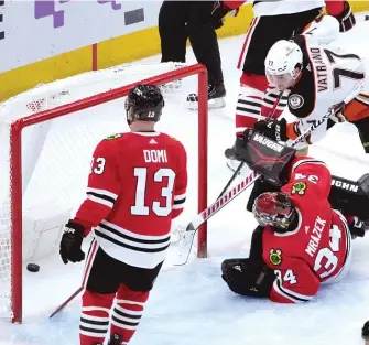  ?? CHARLES REX ARBOGAST/AP ?? Frank Vatrano slips the game-winning goal past Blackhawks goalie Petr Mrazek.