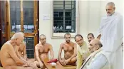  ?? - PTI ?? Union home minister Amit Shah and Madhya Pradesh CM Shivraj Singh Chauhan seek blessings from Acharya Vidyasagar­ji Maharaj in Jabalpur on Saturday.