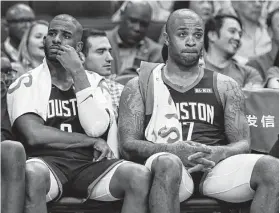  ?? Yi-Chin Lee / Staff photograph­er ?? The Rockets’ Chris Paul, left, and P.J. Tucker contemplat­e the third straight loss to a Western Conference foe and second to the Clippers in the past three games.