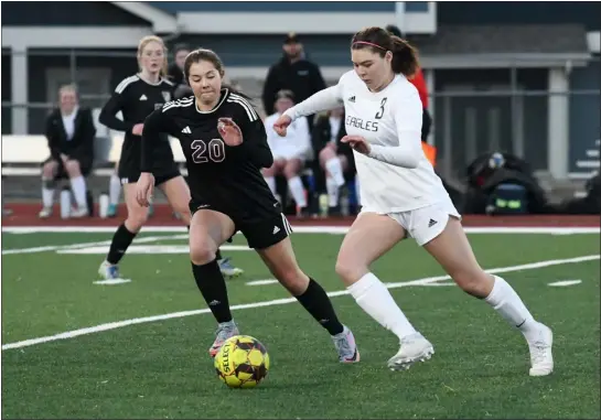  ?? NATHAN WRIGHT — LOVELAND REPORTER-HERALD ?? Thompson Valley’s Brooke Matheson, right, works against Berthoud’s Emily Rogers during their game Tuesday at Max Marr Field in Berthoud.