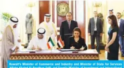  ??  ?? Kuwait’s Minister of Commerce and Industry and Minister of State for Services Affairs Khaled Al-Roudhan (left) and Egypt’s Minister of Investment and Internatio­nal Cooperatio­n Sahar Nasr sign an agreement between the two countries.