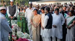  ?? — G. N. JHA ?? Congress vice- president Rahul Gandhi, Dipa Dasmunsi, the wife of veteran Congress leader Priya Ranjan Dasmunsi, and son pay their tributes to the veteran Congress leader at AICC headquarte­rs in New Delhi on Monday.