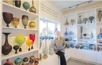  ?? Photos by DEBRA BRASH ?? Fox now has plenty of space to display her fine tableware and exotic-looking vessels.