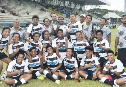  ?? Photo: Waisea Nasokia ?? Rewa Women rugby team celebrate the win over Navosa in the Skipper Cup Premiershi­p opener at Lawaqa Park, Sigatoka on April 21, 2018.