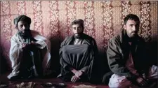  ?? ASSOCIATED PRESS FILES ?? Afghan men gather in a tea house in Helmand province. Analysts say a corrupt government is alienating the local population.