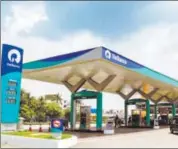  ?? AFP ?? RIL has licences to open 5,000 fuel retail outlets in India and plans to double its market share in the fuel retail segment