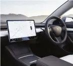  ?? ?? Inside the Tesla Model 3 with autopilot