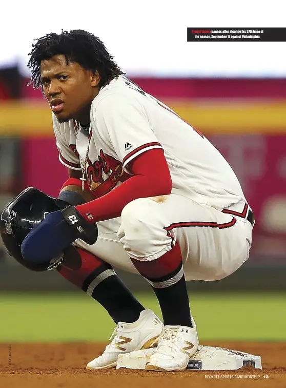  ??  ?? Ronald Acuna pauses after stealing his 37th base of the season, September 17 against Philadelph­ia.