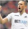  ??  ?? JOY Sigurdsson after his goal earned Swans a point