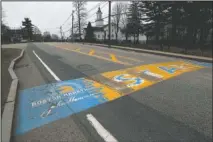  ?? The Associated Press ?? CANCELED MARATHON: In this Monday April 20 file photo, the Boston Marathon start line in Hopkinton, Mass., is vacant on the scheduled day of the 124th race, due to the COVID-19 virus outbreak. The 2020 Boston Marathon, which was reschedule­d to run on Sept. 14th, was canceled Thursday May 28 for the first time in its 124-year history.