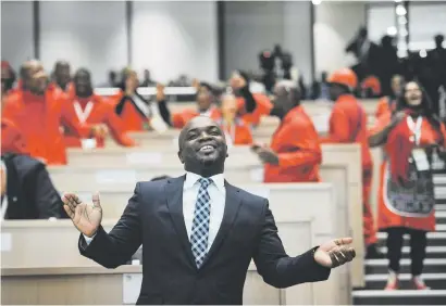  ?? Picture: Jacques Nelles ?? ALLIES. Tshwane mayor Solly Msimanga sings and dances along with EFF members before his State of the Capital address yesterday.